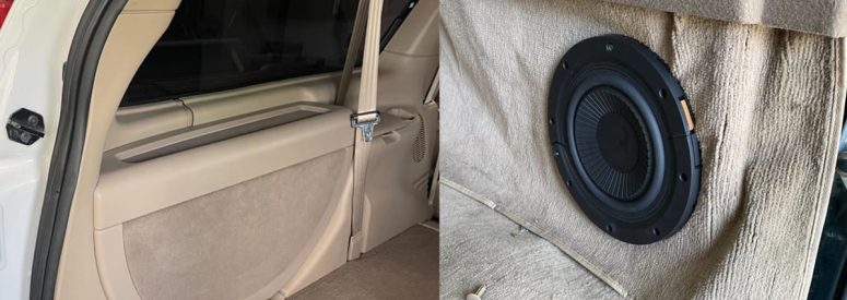 The inside of the back of a car on one side of the image, a speaker installed into upholstery on the other